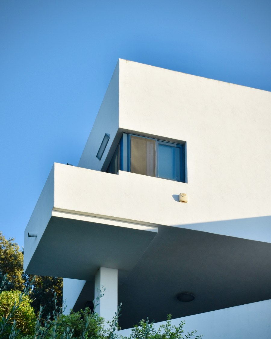 Contemporary villa balcony detail against a blue sky in Mykonos